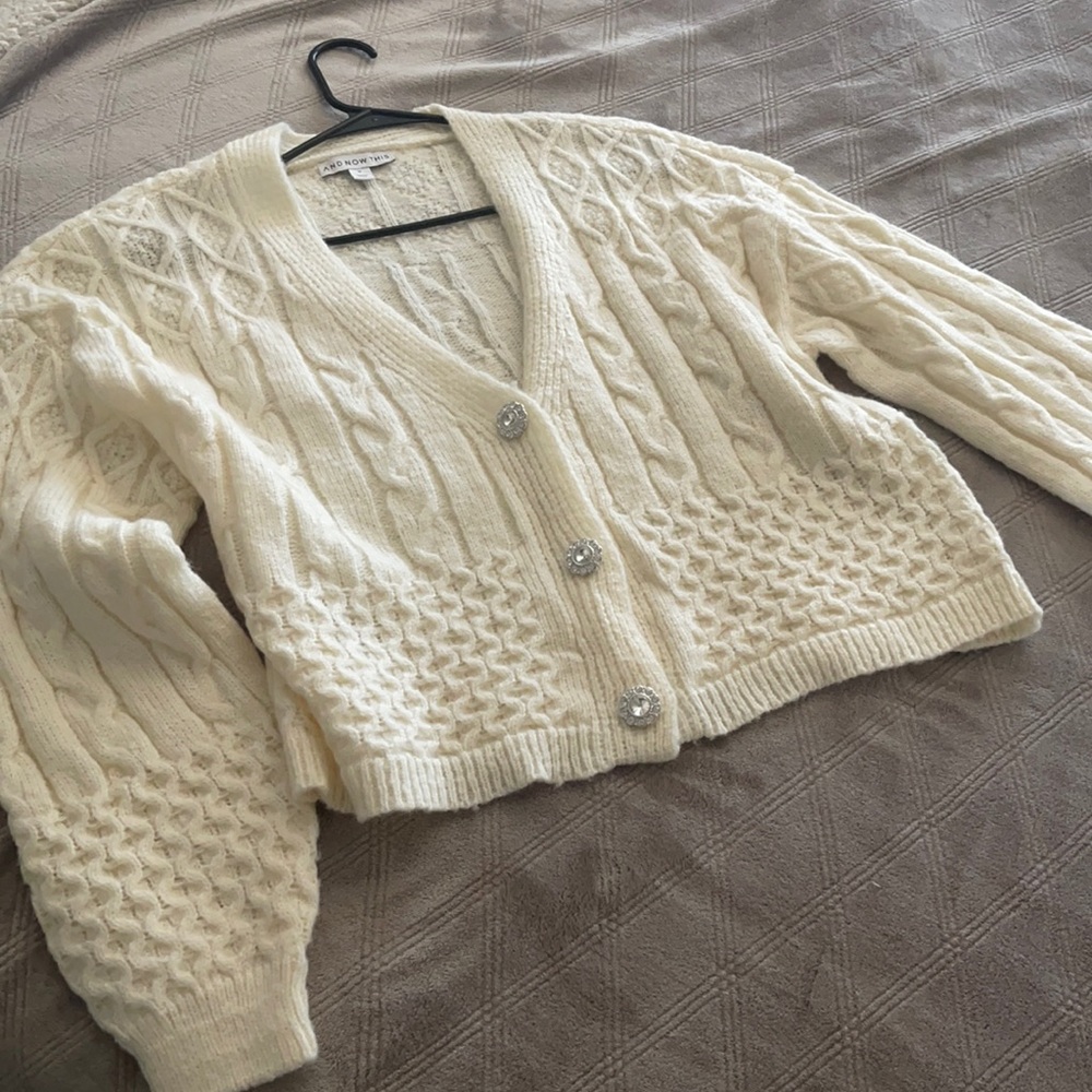Never worn sweater. So cute with rhinestone buttons